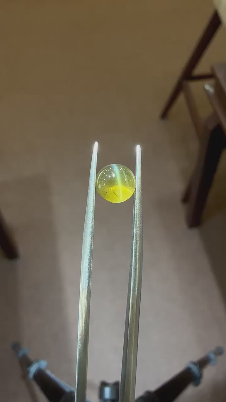 猫眼石 2.34克拉天然猫眼方柱石，圆形切割，半透明